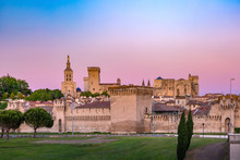 Palace Of The Popes, Once Fortress And Palace, One Of The Largest And Most Important Medieval Gothic Buildings In Europe, At Sunset, Avignon, France