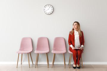 young woman waiting for job interview indoors