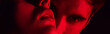 © LIGHTFIELD STUDIOS - close up view of passionate young couple kissing in red light, panoramic shot