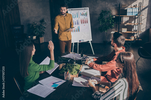 Fotomural Photo of students attending training at business grammar discussing strategies t