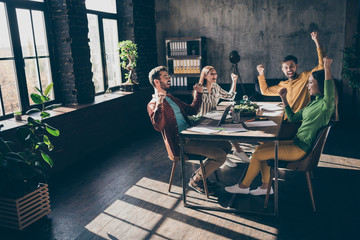 Sticker - Cheerful cheery glad businesspeople company owners wearing casual formal-wear celebrating winning great breakthrough at modern industrial loft wood brick style interior work place station open space