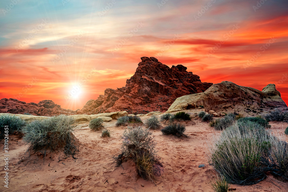 Sunset hiking on the trails in the Valley of Fire State Park near Las Vegas, Nevada, USA. - obrazy, fototapety, plakaty 