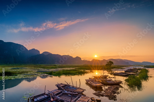 Cuadros en Lienzo Landscape with boat in Van Long natural reserve in Ninh Binh, Vietnam