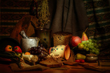 Retro Style Kitchen Still Life With Fresh Vegetable And Fruit Ingredients, Cuts Of Bread On A Wooden Table