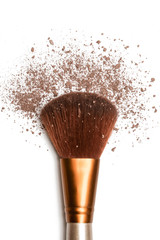 Close up image of big makeup brush with brown loose powder isolated on white