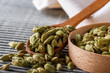 fragrant green cardamom on a wooden rustic background