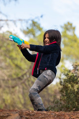 Wall Mural - Cute girl with water gun