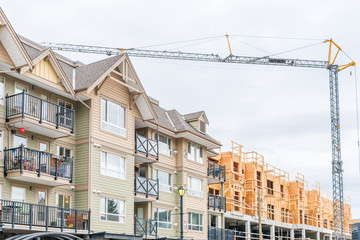 Building under construction. The site with crane.