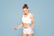 © neonshot - Active happy fit girl with centimeter.