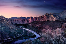 Smith Rock State Park Landscape Of Mountains And A River Under A Violet Evening Sky In Bend, Oregon USA.