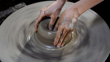 Potters Hands Are Creating A Jar Or Vase Of Earthenware On Wheel