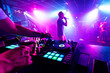 © alexkoral - artist with a microphone performs on the stage of a nightclub