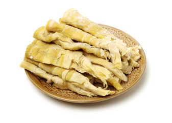 Poster - dried bamboo shoot on white background 