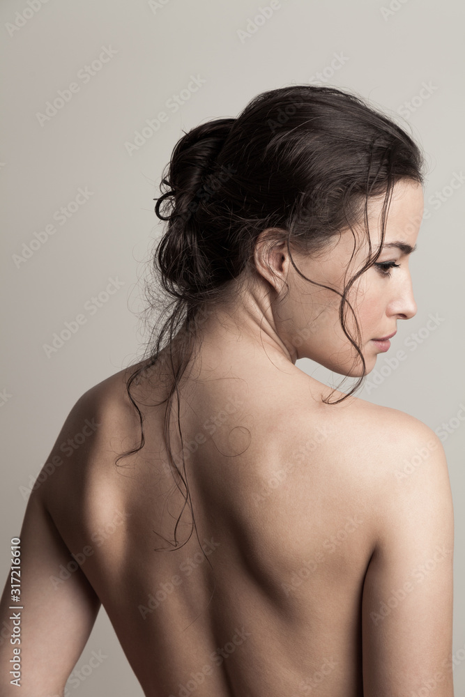 natural beauty concept young woman with wet hair in bun profile and back studio shot - obrazy, fototapety, plakaty 