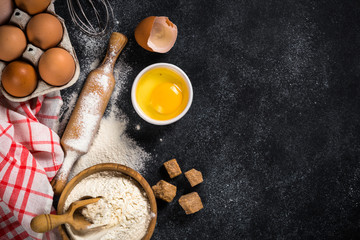 ingredients for cooking baking on black.