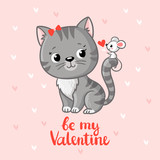Fototapeta Dinusie - Cute gray kitten looking at a mouse that sits on the tail and holding a heart.
