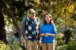 © creativeimages - Happy senior couple admiring view at park
