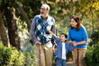 © creativeimages - Happy grandparents spending leisure time with little grandson