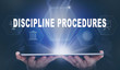 © Duncan Andison - Businessman holding a computer tablet display projecting a Discipline Procedures concept.