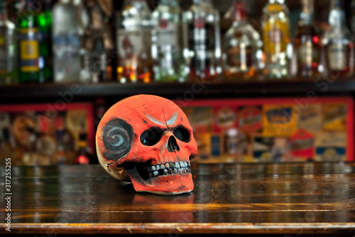 Human Skull On A Bar Counter Red Skull On A Background Of Bottles With Alcohol Biker Pub Buy This Stock Photo And Explore Similar Images At Adobe Stock Adobe Stock