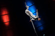 strong acrobat posing while performing in circus