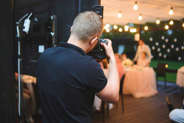 photographer making photos at restaurant