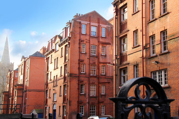 old red brick houses on the city streets, concept of old Europe