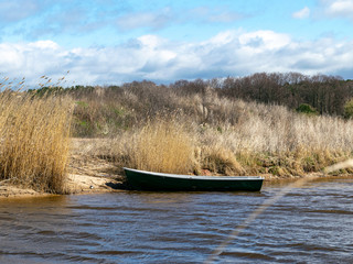 Wall Mural - landscape with fisherman's boat by the sea