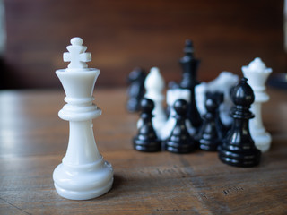  Isolate white king. Chess business idea for competition in world market, success and leadership concept.