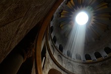 Low Angle Shot Of The Light Coming From The Ceiling In A Historic Cathedral In Jerusalem