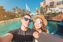Tourism And Holiday Resorts - A Couple In Love During Their Honeymoon Taking A Selfie Photo In Dubai, UAE