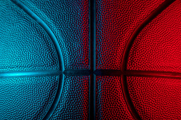 Wall Mural - Closeup detail of basketball ball texture background. Blue neon Banner Art concept