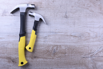 Sticker - Hammer iron on wooden background