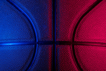 Wall Mural - Closeup detail of basketball ball texture background. Blue neon Banner Art concept