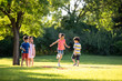 © Blue Jean Images - Happy children playing on meadow