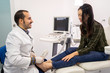 © Juan Alberto Ruiz/ADDICTIVE STOCK - Podiatry doctor using ultrasound scanner