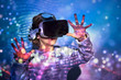 © PHILIPPE DEGROOTE/ADDICTIVE STOCK - Child wearing virtual glasses at home with colored light effects