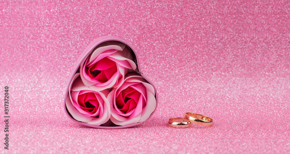 box surprise gift pink heart with gold wedding rings with roses on a ...