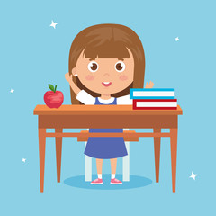 Wall Mural - student girl sitting in school desk, back to school