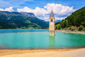 Wall Mural - Church in the lake Reschensee bell tower, South Tyrol, Italy