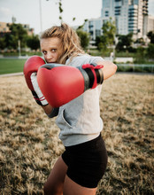 Young Woman Boxing