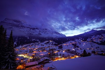 scenic mountain view of grindelwald, switzerland in winter
