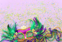 Holidays Image Of Mardi Gras Masquarade Venetian Mask Over Purple Background. View From Above