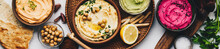 Flat-lay Of Various Vegetarian Dips Hummus