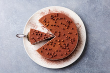 Tiramisu Cake With Chocolate Decotaion On A Plate. Grey Stone Background. Top View.