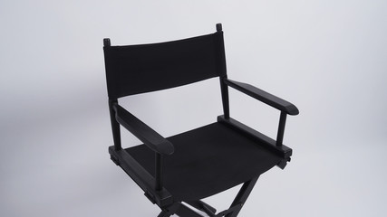 Black director chair use in video production or movie and cinema industry. It's put on white background..