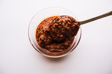 Wall Mural - Homemade Tandoori Paste or Marinade mixture, in a bowl. used for grilled chicken or Paneer or vegetable. selective focus