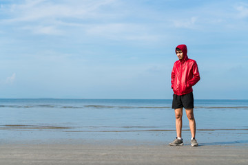 Poster - A male boxer practicing boxing at beach