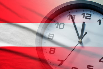 Wall Mural - austria flag with dial of a clock