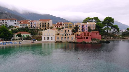 Wall Mural - Colorful houses on the bay in Asos. Greece. Aerial view.